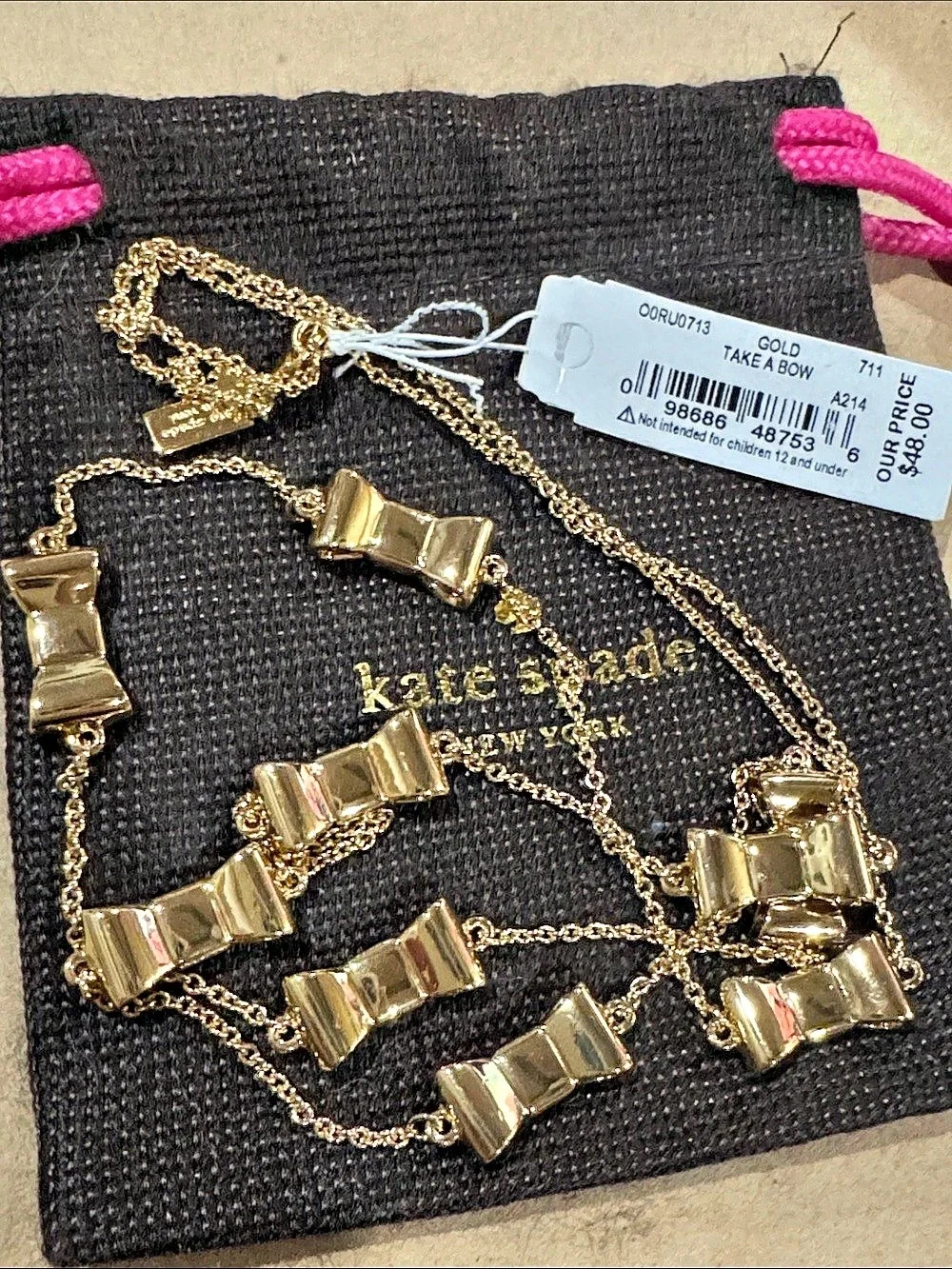 Kate Spade Take a Bow Statement Necklace Gold NWT